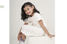 Mamma & Amour baby girl in cream organic cotton dress for Onam season