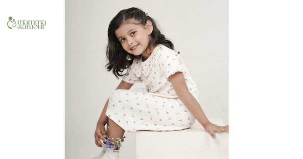 Mamma & Amour baby girl in cream organic cotton dress for Onam season