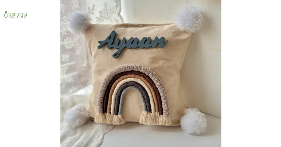 Personalized macrame name wall hanging with rainbow and pom-poms for baby nursery decor India