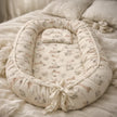 Mamma & Amour organic newborn baby nest india with bunny print and matching pillow for baby room decor