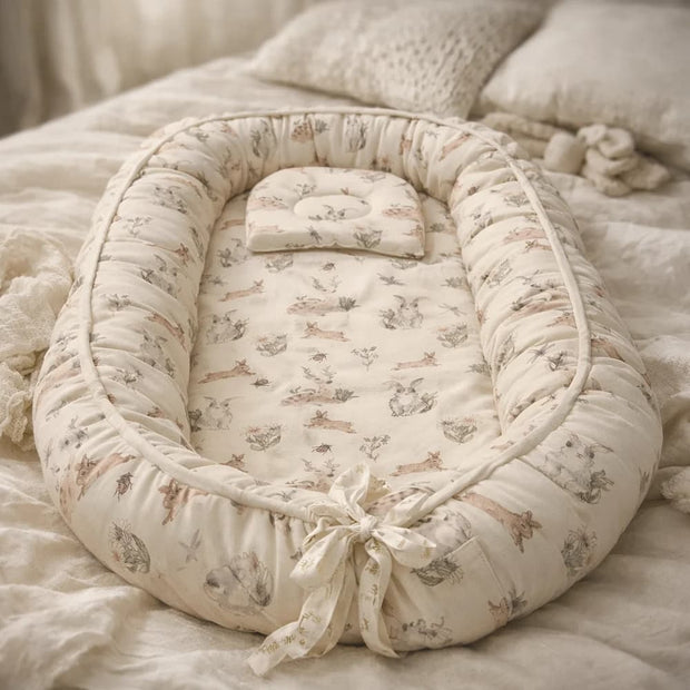 Mamma & Amour organic newborn baby nest india with bunny print and matching pillow for baby room decor