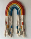 Personalised macrame rainbow name wall hanging with colourful cotton cord and natural fringe tassels – handcrafted nursery décor by Mamma & Amour