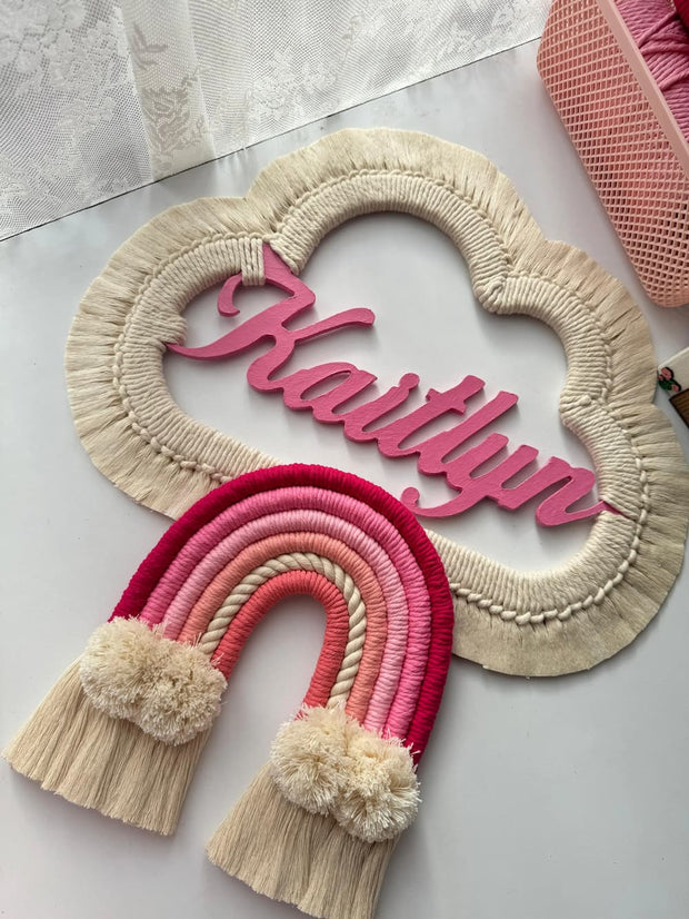 Mamma & Amour personalised Kaitlyn baby name wall hanging india with pink macrame rainbow and cloud frame