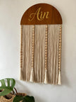 Mamma & Amour personalised wooden name wall hanging with cotton tassels and bead accents